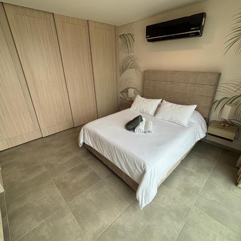 Hermoso y moderno Loft con Piscinas, vista al Mar y cerca de la Playa - Apartamento Loft de 1 dormitorio - 8