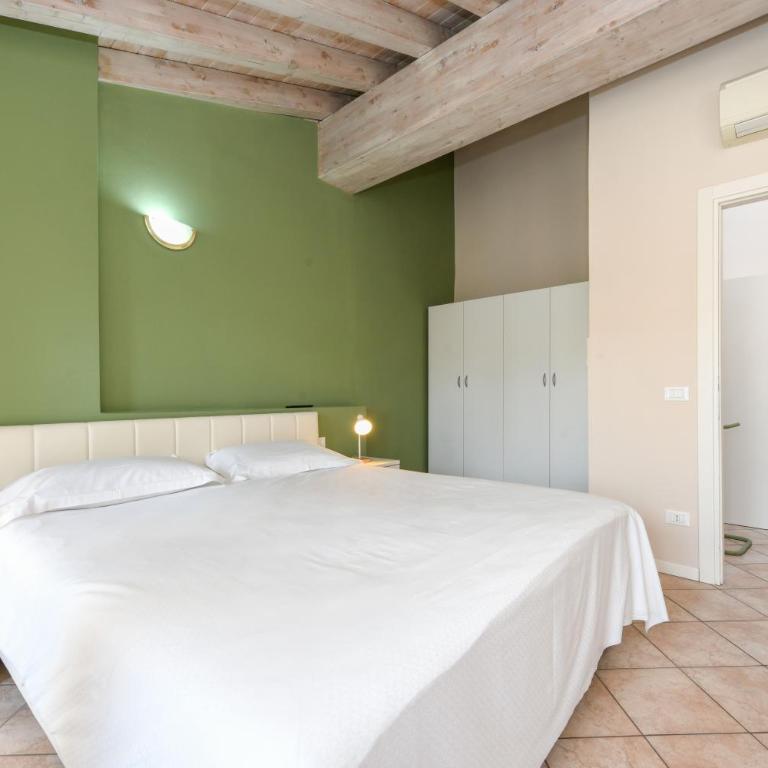 Flowers Apartments - Appartamento Deluxe con 2 Camere da Letto e Balcone - 20