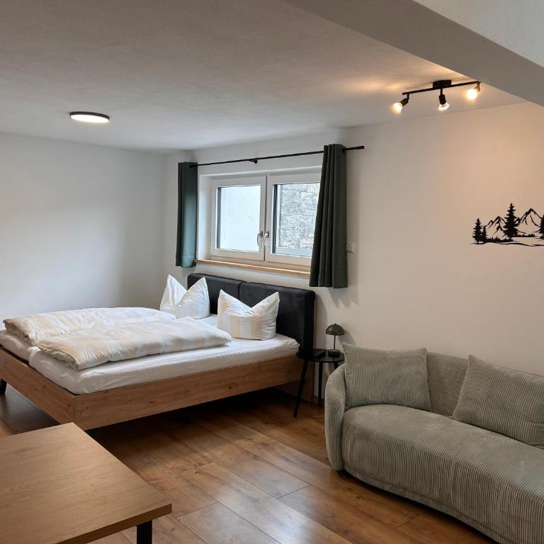 Apartment im Souterrain mit Terrasse - Apartment mit 1 Schlafzimmer - 3