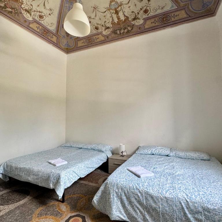 Affittacamere La Stazione - zona ospedale - Bike Welcome - Camera Quadrupla con Bagno in Comune - 1