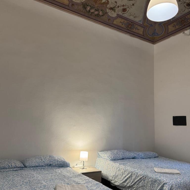 Affittacamere La Stazione - zona ospedale - Bike Welcome - Camera Quadrupla con Bagno in Comune - 8