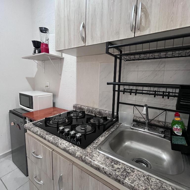 Bonito departamento en privada con alberca - Apartamento de 2 dormitorios - 30