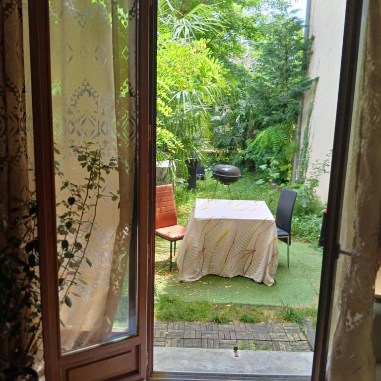 COMME A LA MAISON Chez Domi Coquet T2 Avec JARDIN - Chambre Double - 2