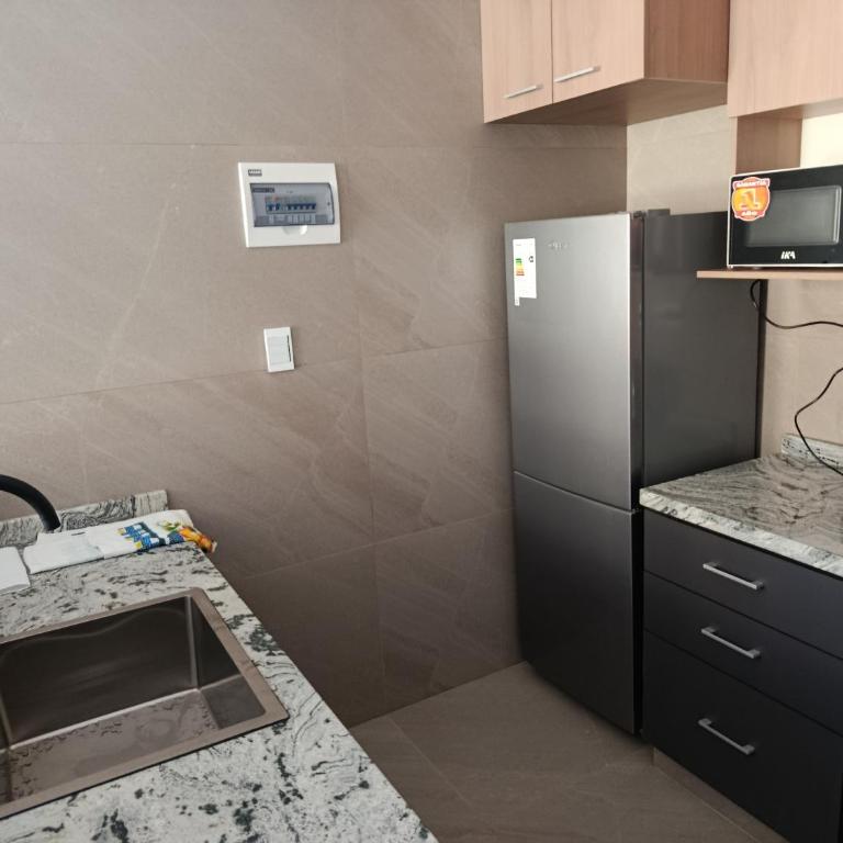 Departamento a estrenar excelente ubicacion Achumani - Apartamento de 1 dormitorio - 7