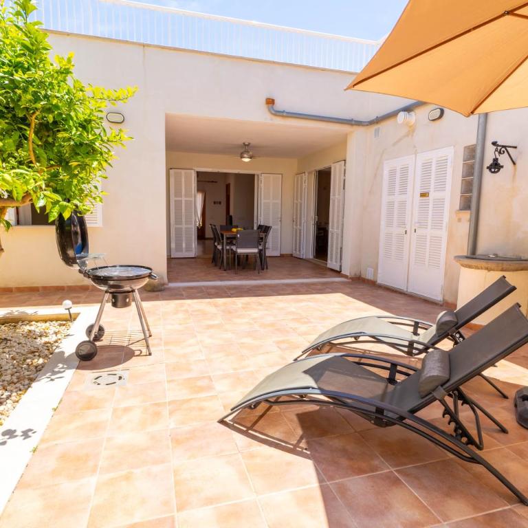 Casa Embat, a pocos metros de la playa - Three-Bedroom House - 20