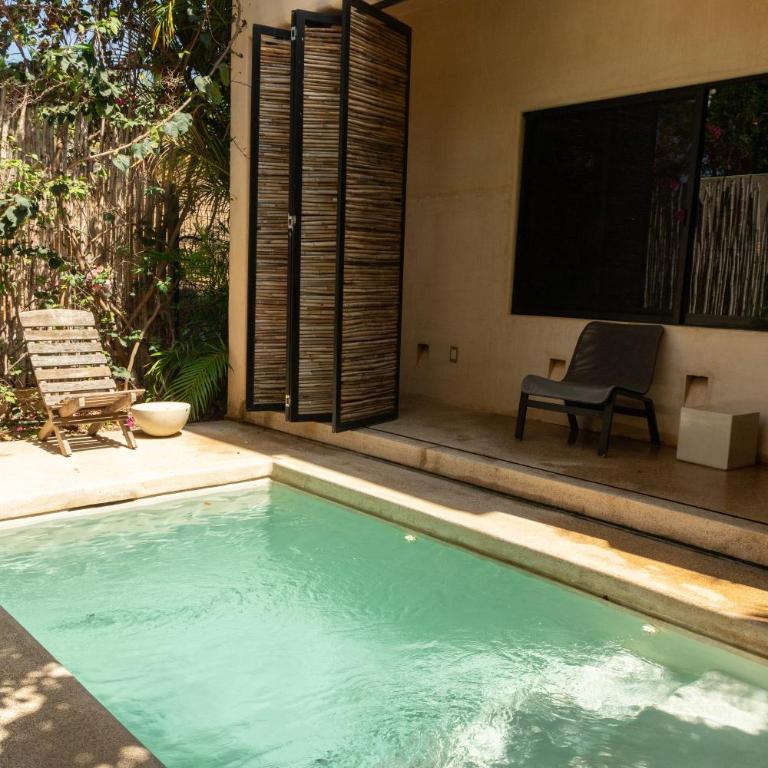 Casa Vilú - Bungalow Deluxe con vistas al jardín - 12