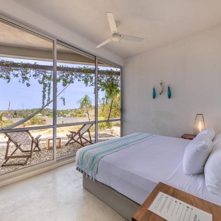 Casa Cascada - Adults Only - Habitación con cama extragrande y vistas al jardín - 1