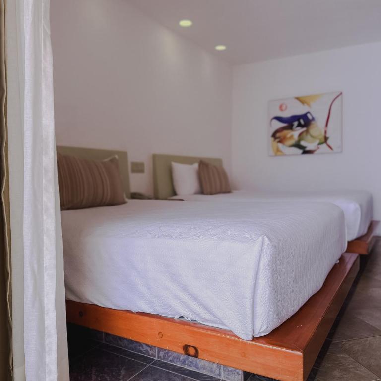 Hotel Los Patios - Habitación Estándar con 2 camas extragrandes y balcón - 10