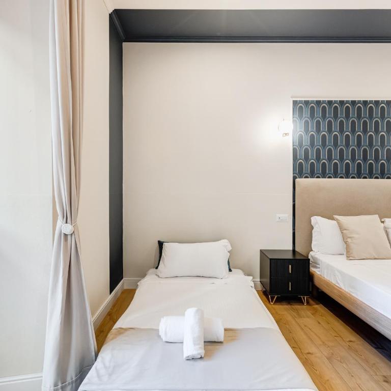 Vivilo Collection - Charme 24 Suites - Close to Via Veneto - Camera Tripla con Vasca - 1