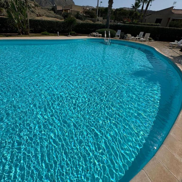 Casa Vacanze Libeccio - Villetta con giardino e piscina condominiale - Casa Vacanze - 65