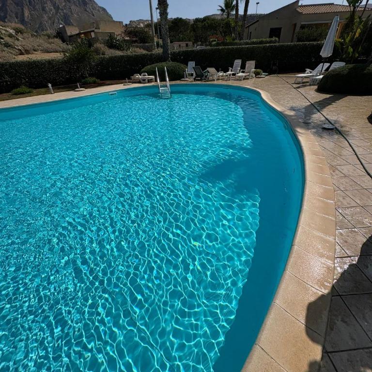 Casa Vacanze Libeccio - Villetta con giardino e piscina condominiale - Casa Vacanze - 66