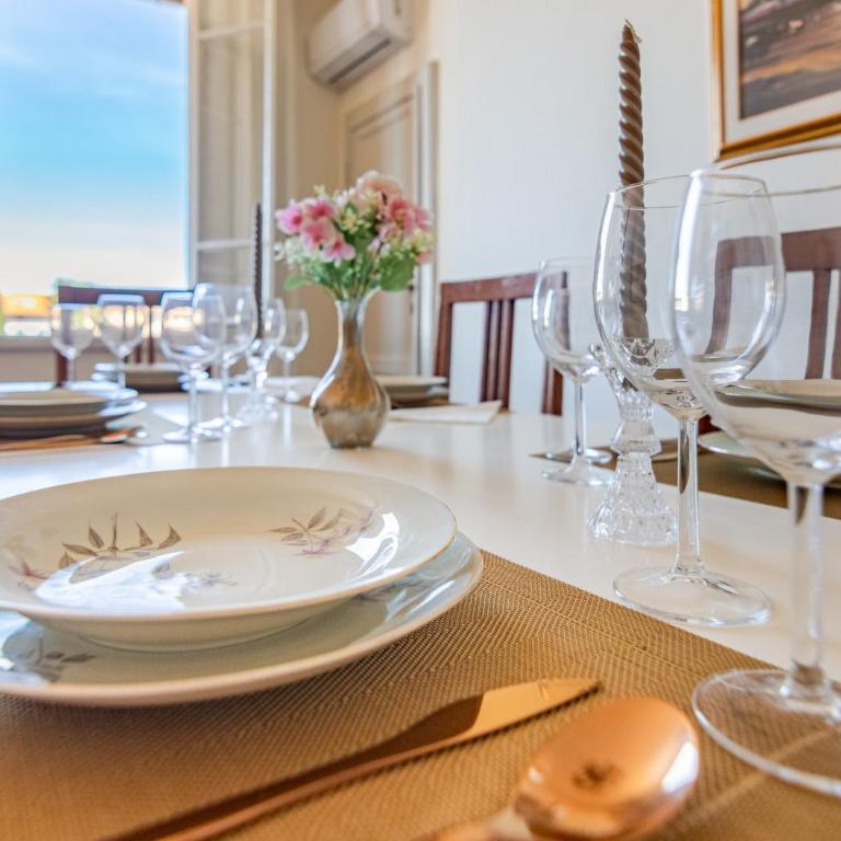 Hostly-San Giuseppe Luxury Apartment-By the Tower - Two-Bedroom Deluxe Apartment with Balcony - 11