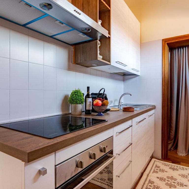 Hostly-San Giuseppe Luxury Apartment-By the Tower - Two-Bedroom Deluxe Apartment with Balcony - 33