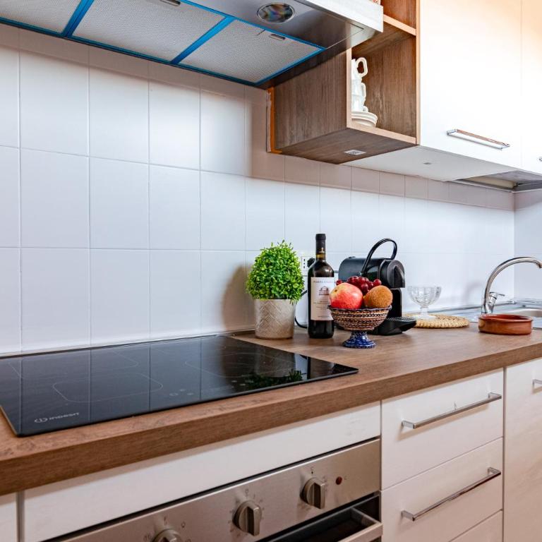 Hostly-San Giuseppe Luxury Apartment-By the Tower - Two-Bedroom Deluxe Apartment with Balcony - 47