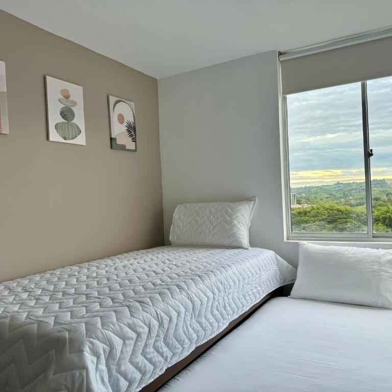 Refugio Central con Parqueo Privado - Apartamento de 2 dormitorios - 4
