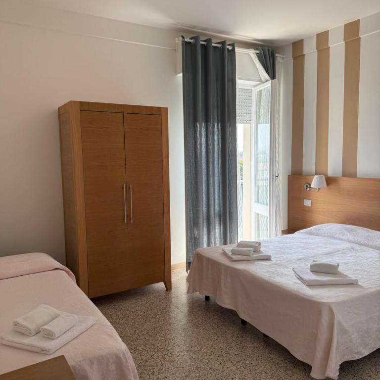 Hotel Gin sul mare - Camera Quadrupla - 9