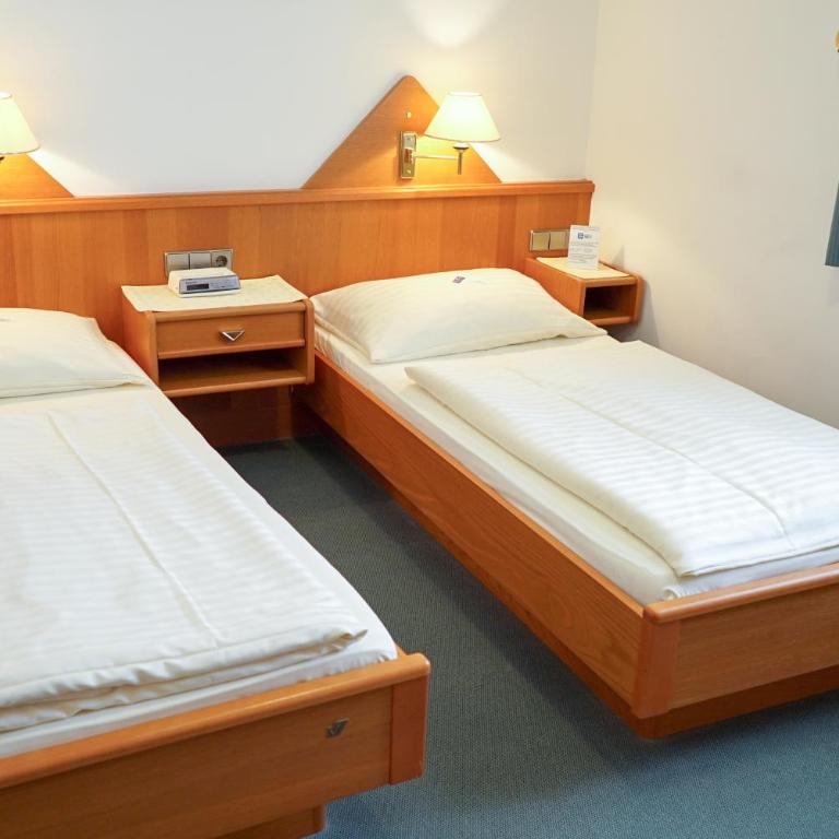 Pension Besser - Standard Zweibettzimmer mit Gartenblick - 2