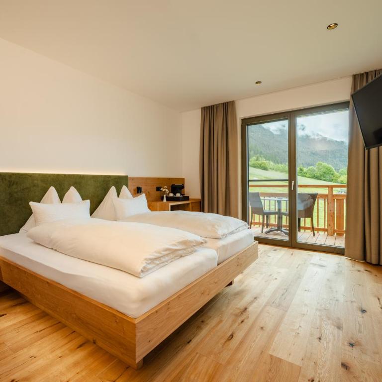 Ferienhof Obergasser und Bergblick - Doppelzimmer mit Balkon und Seeblick - 1