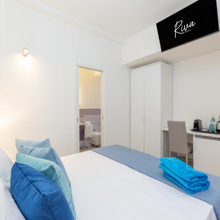 Riva rooms - by Obiettivo vacanza Budoni - Camera Matrimoniale/Doppia con Letti Singoli con Bagno Privato - 1