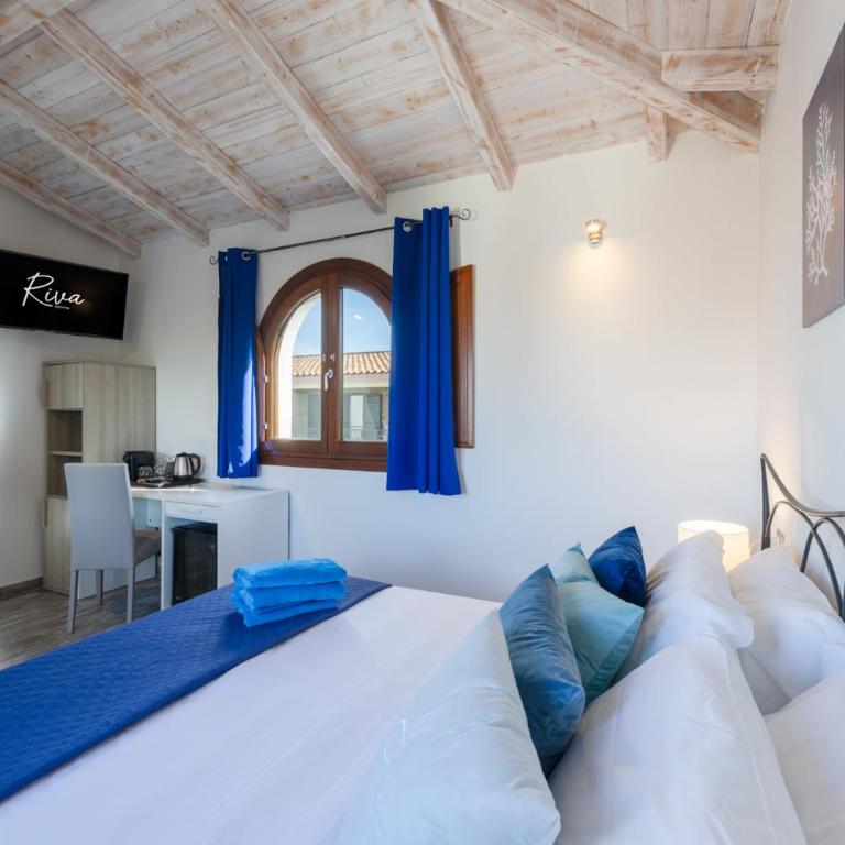 Riva rooms - by Obiettivo vacanza Budoni - Camera Matrimoniale/Doppia con Letti Singoli con Bagno Privato - 11