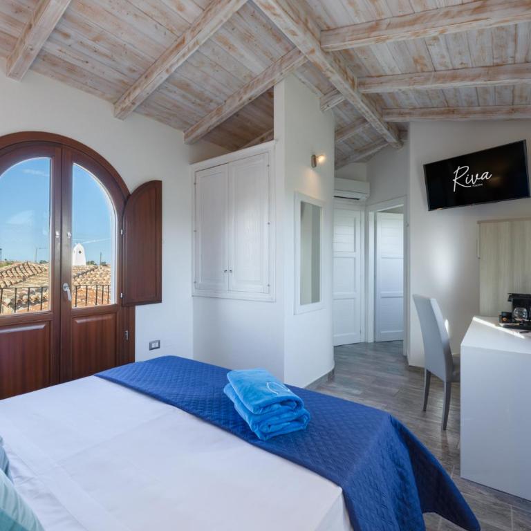 Riva rooms - by Obiettivo vacanza Budoni - Camera Matrimoniale/Doppia con Letti Singoli con Bagno Privato - 13
