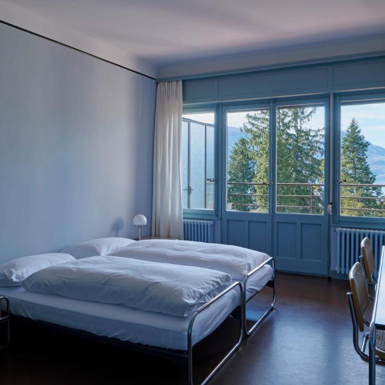 Hotel Monte Verità - Camera Comfort Doppia con Letti Singoli con Balcone e Vista Lago - 1