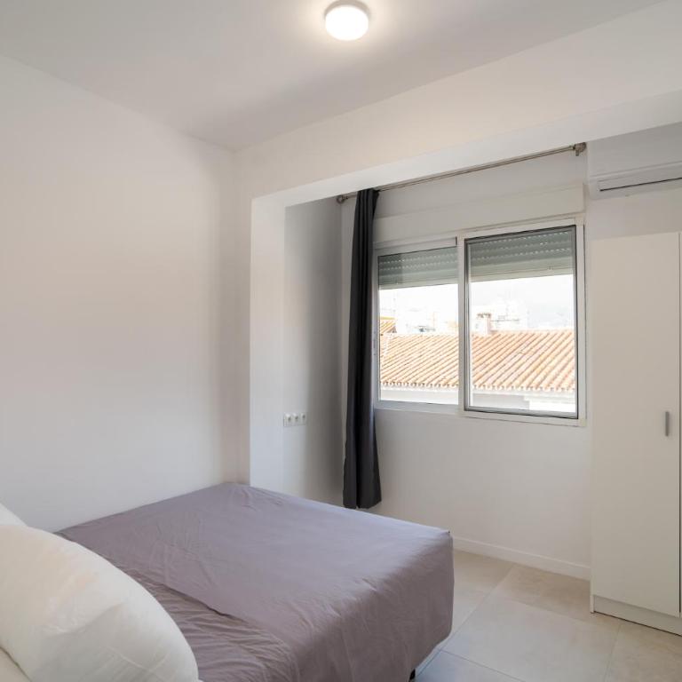 Apartamento con vistas al mar y la montaña - Three-Bedroom Apartment - 17