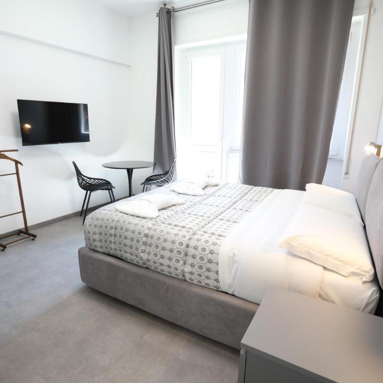 Unique Stay Tiburtina - Camera Matrimoniale con Bagno in Comune - 7
