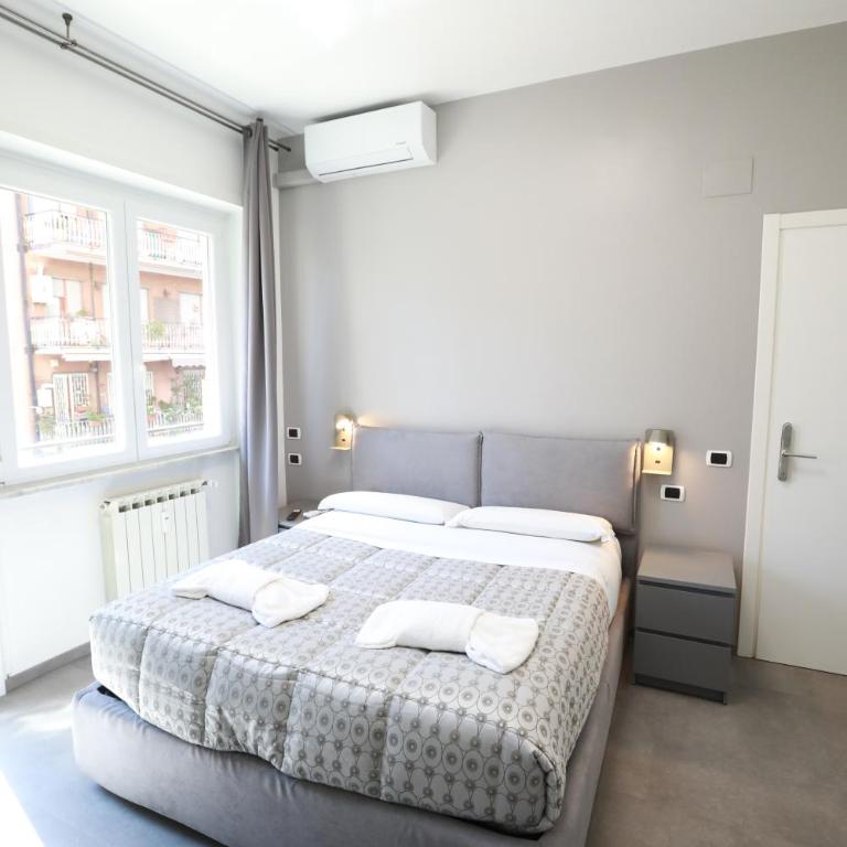 Unique Stay Tiburtina - Camera Matrimoniale con Bagno in Comune - 4