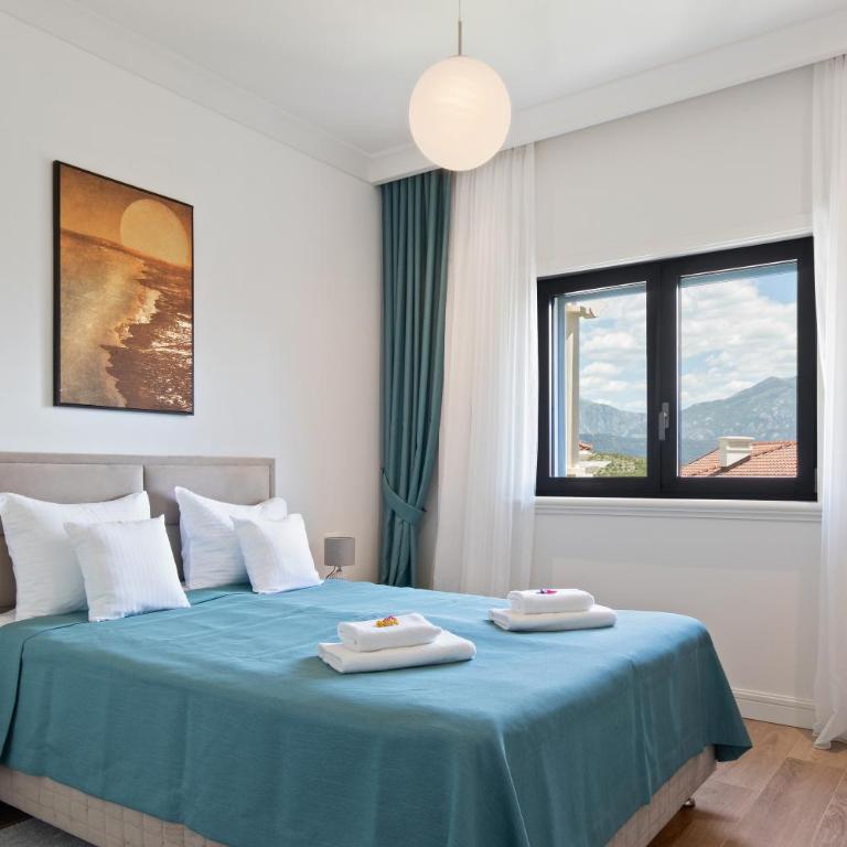 Lustica Apartments Central Bay - Two-Bedroom Deluxe Apartment with Garden View - 16