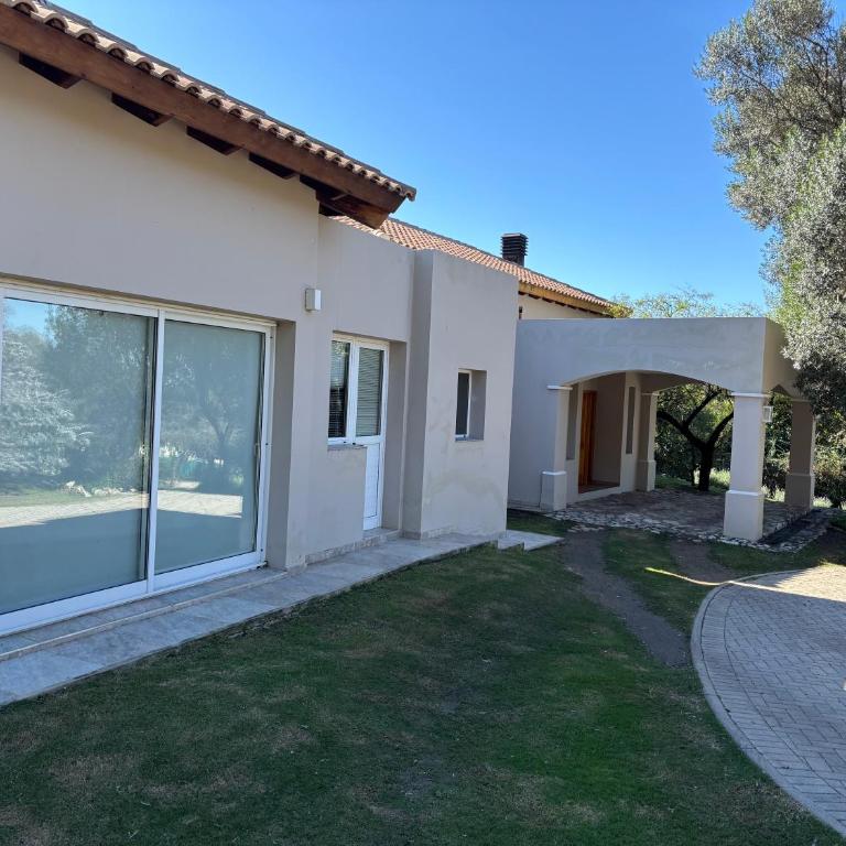 Casa sobre la Cancha de golf Potrerillo de Larreta - Casa de 4 dormitorios - 35