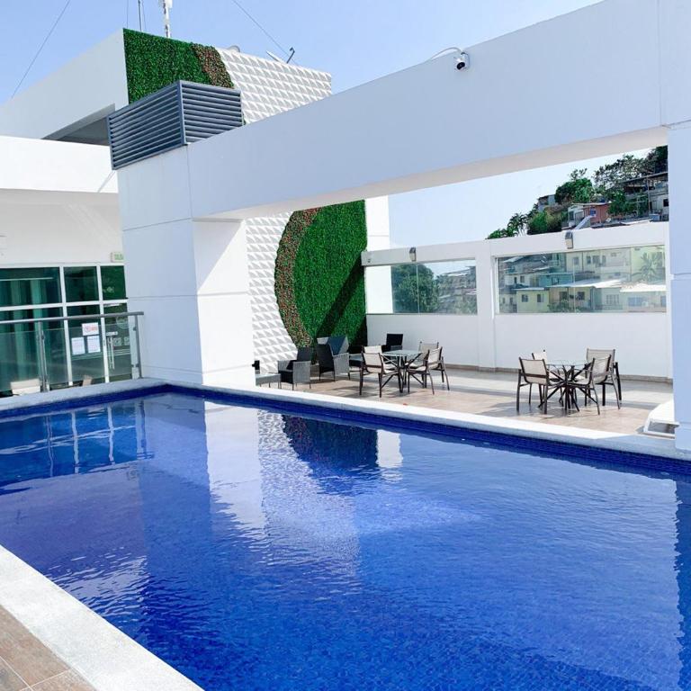 2 dormitorios, vista lateral al rio, parqueo, Puerto Santa Ana - Apartamento de 2 dormitorios con vistas al río - 32