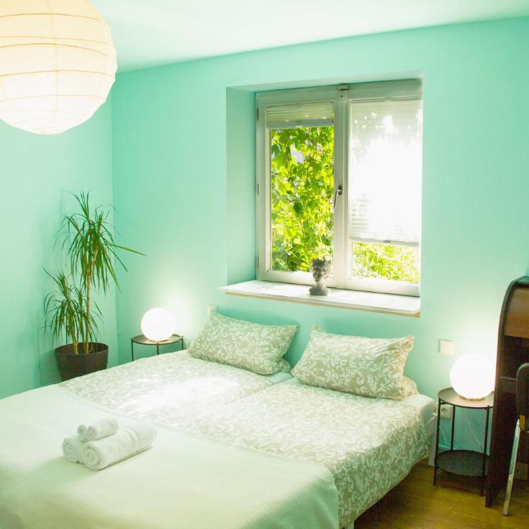 Vis-à-Vis Schloss Nymphenburg - Rondellapartments - Zweibettzimmer mit Blick - 2