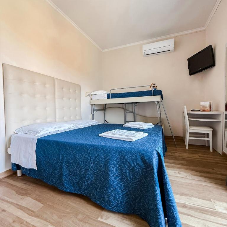 Hotel Bella Igea - Camera Quadrupla Comfort - 10