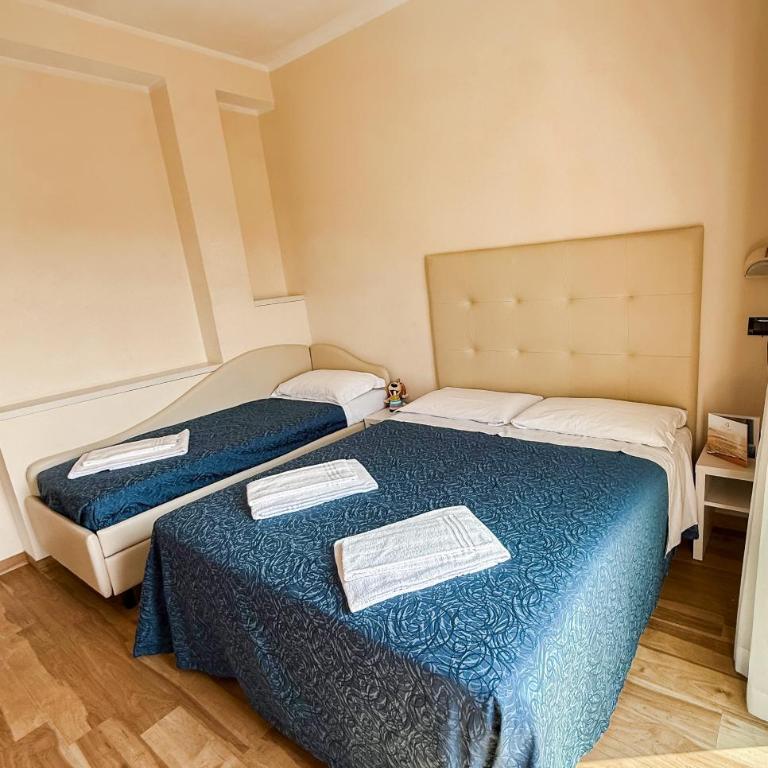 Hotel Bella Igea - Camera Quadrupla Comfort - 1