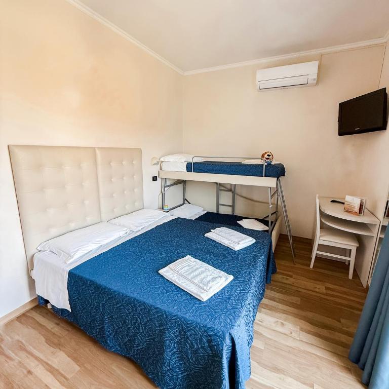 Hotel Bella Igea - Camera Quadrupla Comfort - 11