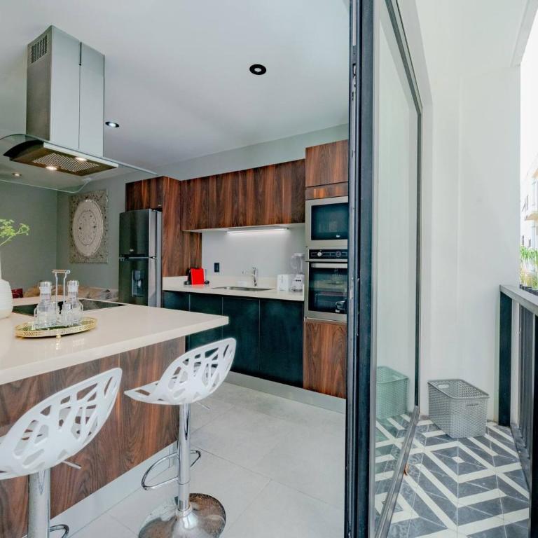1 BR Condo with Rooftop Pool & Bar - At IT Residences - Condo Iris - One-Bedroom Apartment - 12
