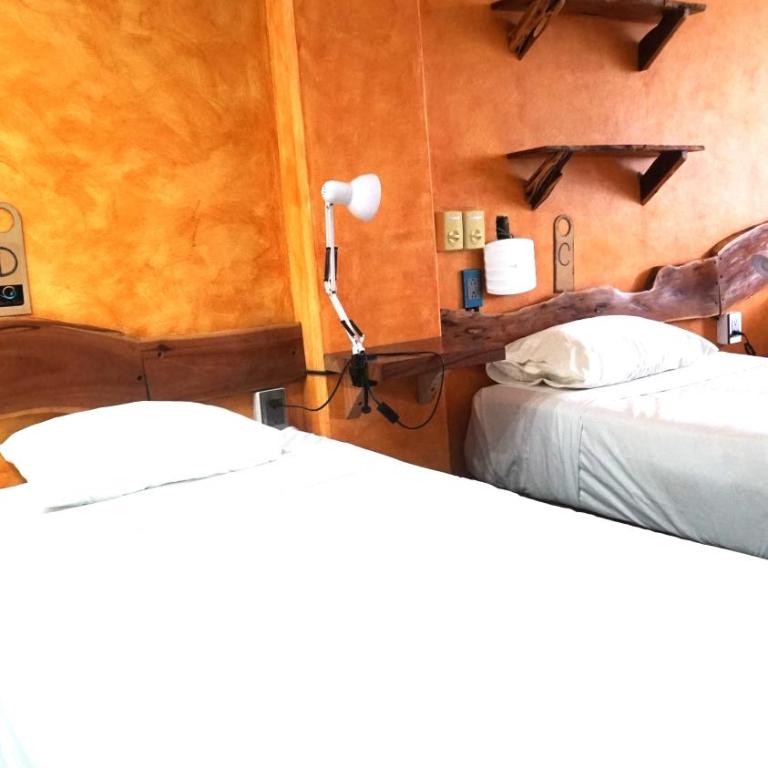 Madre Tierra Hostal - Cama individual en habitación compartida mixta - 8