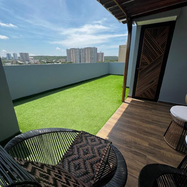 Duplex Penthouse Rooftop Lounge - Three-Bedroom Apartment - 21