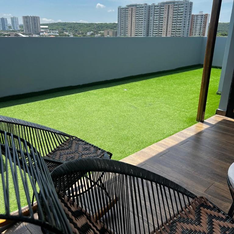 Duplex Penthouse Rooftop Lounge - Three-Bedroom Apartment - 24