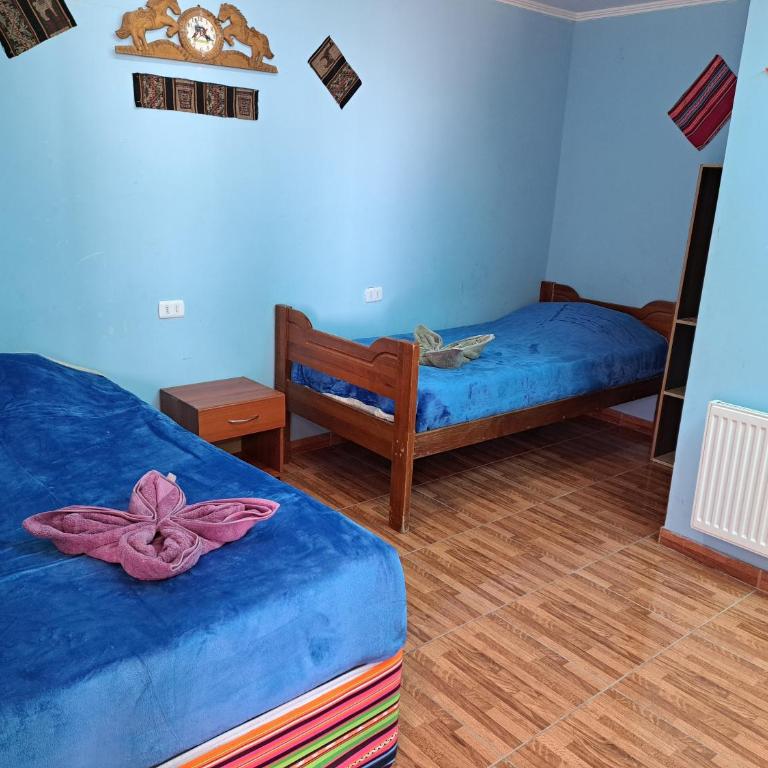 Hostal El Amigo Lucho - Habitación Cuádruple con baño privado - 1