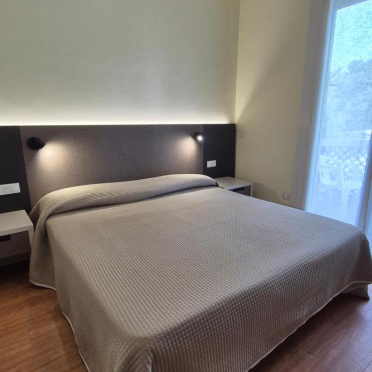 Al Cavallino Bianco - Camera Matrimoniale/Doppia con Letti Singoli con Balcone - 1