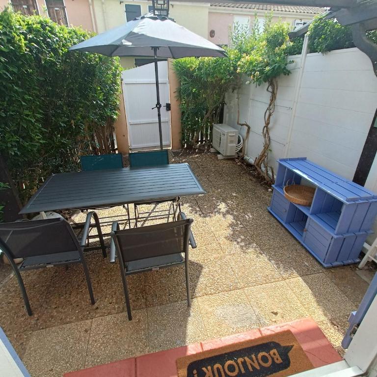 Maison climatisée au bord de l'étang de Thau - résidence avec piscine - Appartement 2 Chambres avec Balcon et Terrasse - 11