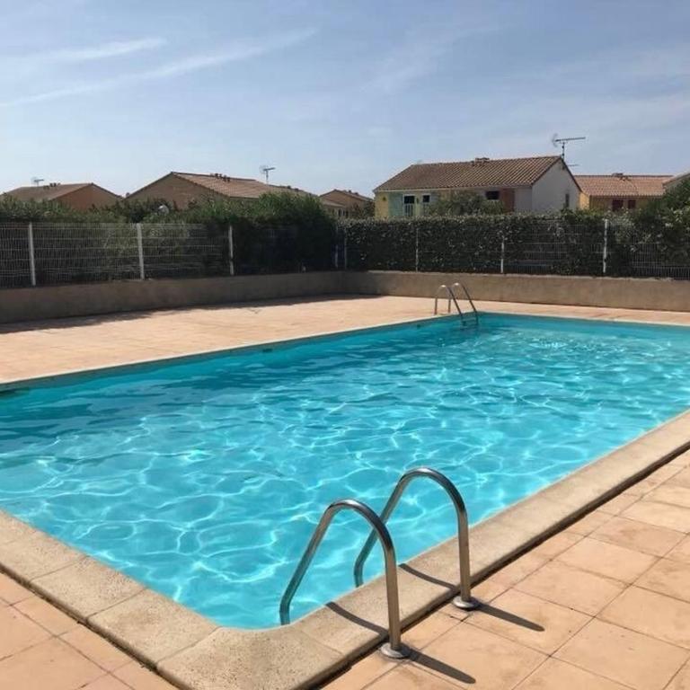 Maison climatisée au bord de l'étang de Thau - résidence avec piscine - Appartement 2 Chambres avec Balcon et Terrasse - 33