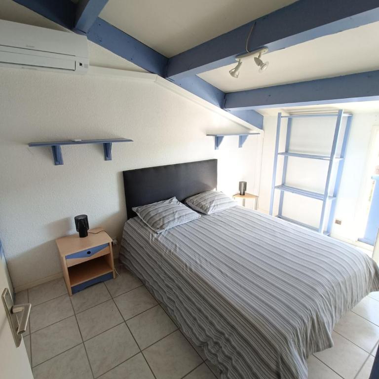Maison climatisée au bord de l'étang de Thau - résidence avec piscine - Appartement 2 Chambres avec Balcon et Terrasse - 12