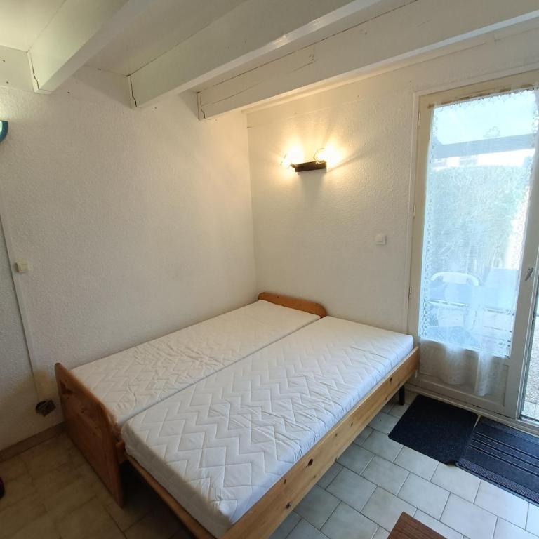 Maison climatisée au bord de l'étang de Thau - résidence avec piscine - Appartement 2 Chambres avec Balcon et Terrasse - 30