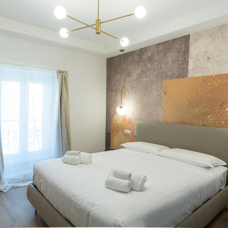 Maison Rasella Suites - Camera Matrimoniale Deluxe (2 Adulti + 1 Bambino) - 1