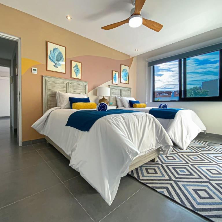 Corasol Condo with Rooftop Pools, Beach Club Access & Private Terrace - Two-Bedroom Deluxe Apartment with Balcony - 11
