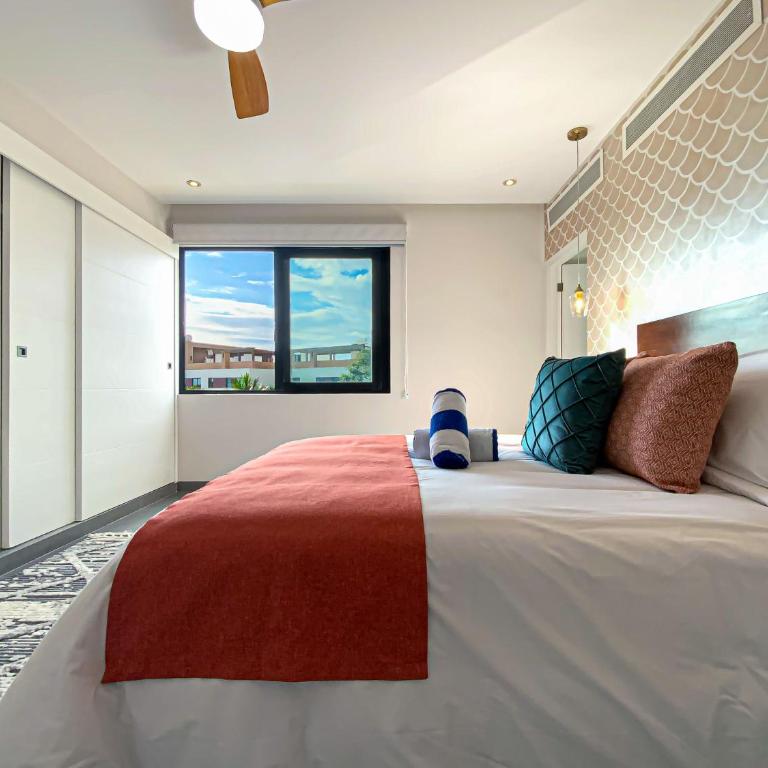 Corasol Condo with Rooftop Pools, Beach Club Access & Private Terrace - Two-Bedroom Deluxe Apartment with Balcony - 10