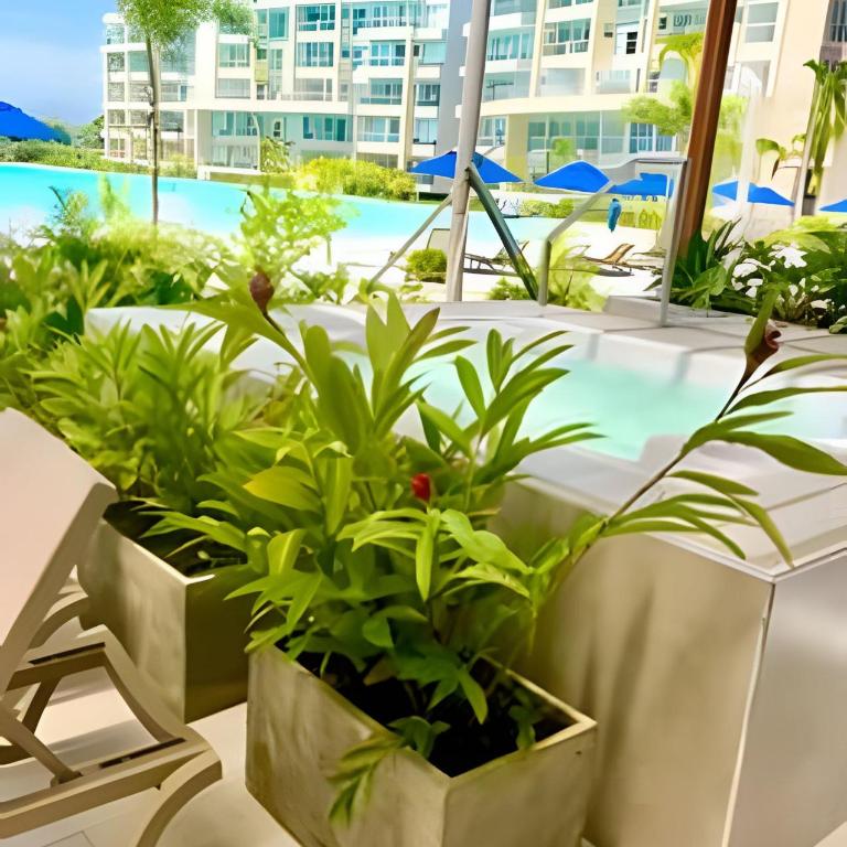 1 Alcoba Hermosa vista a la laguna + bote inflable - One-Bedroom Apartment with Pool View - 30